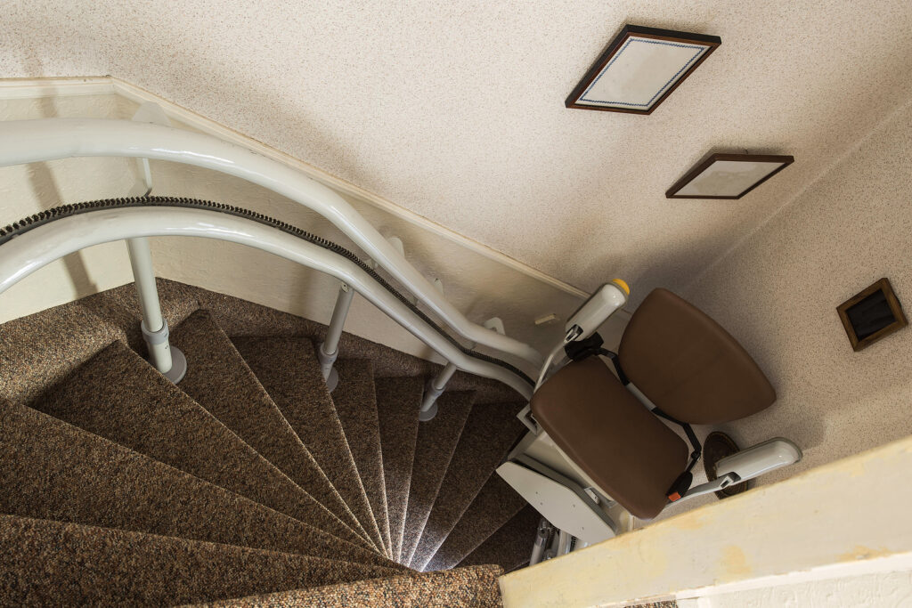 curved stairlift - Stairlift for disabled in a home