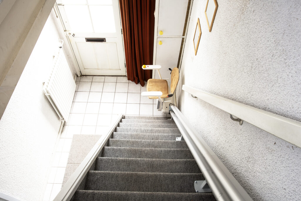 Stairlifts Birmingham - Automatic stair lift on staircase